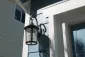 Close view of a charcoal painted exterior beside crisp white trim